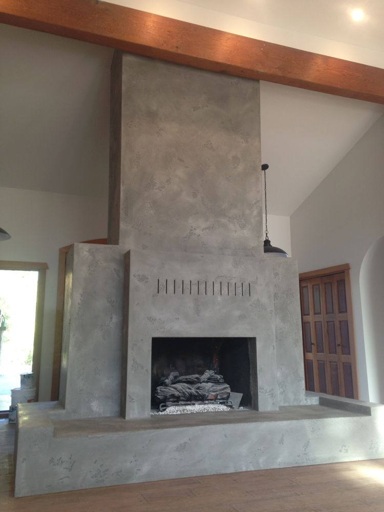 grey plaster fireplace